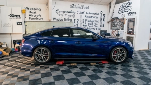 Audi S5 chrome delete. Full car side profile photo.