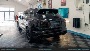 Porsche Cayenne Full Light Tinting - Medium Rears, Light Fronts. Rear 3/4 Photo with Lights Off.