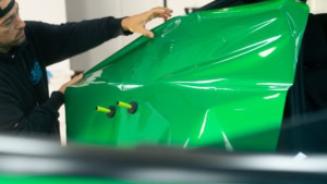 Tesla Model Y - Gloss Green Envy. Rear Quarter Progress Photo 1.