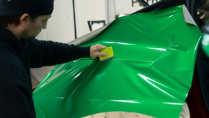 Tesla Model Y - Gloss Green Envy. Rear Quarter Progress Photo 2.