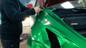Tesla Model Y - Gloss Green Envy. Front wing progress photo 2.