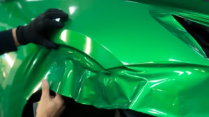 Tesla Model Y - Gloss Green Envy. Front wing progress photo 3.
