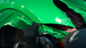 Tesla Model Y - Gloss Green Envy. Front wing progress photo 4.