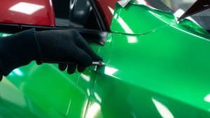 Tesla Model Y - Gloss Green Envy. Front wing progress photo 5.